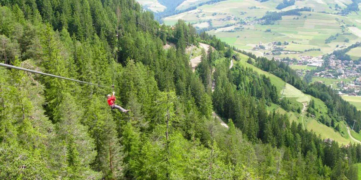 Ziplining Across Lush Forest Valleys